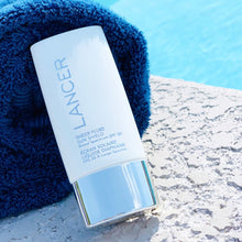 Load image into Gallery viewer, Sheer Fluid Sun Shield SPF 30 (US DOMESTIC) 2.0 fl.oz. tottle