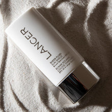 Load image into Gallery viewer, Sheer Fluid Sun Shield SPF 30 (US DOMESTIC) 2.0 fl.oz. tottle